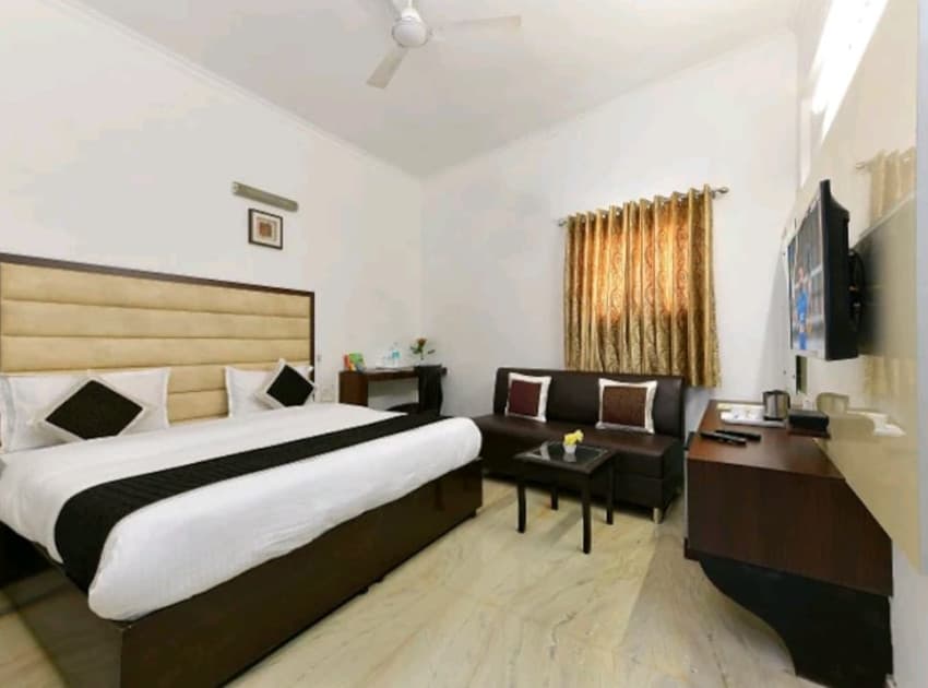 Book Family Interconnected Four Bed Room room in Agra