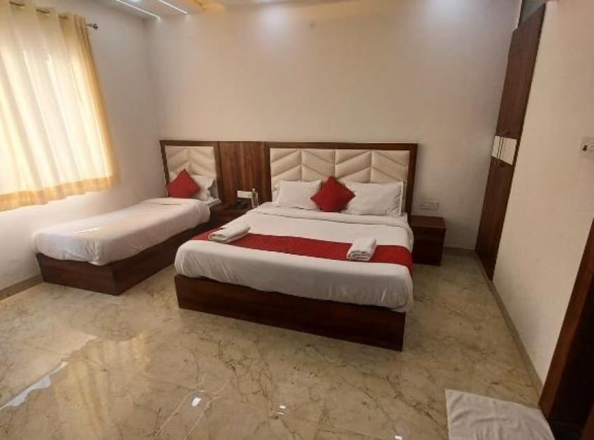 Book Premium Triple Bed Room room in Agra