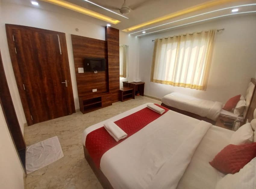 Book Premium Triple Bed Room room in Agra