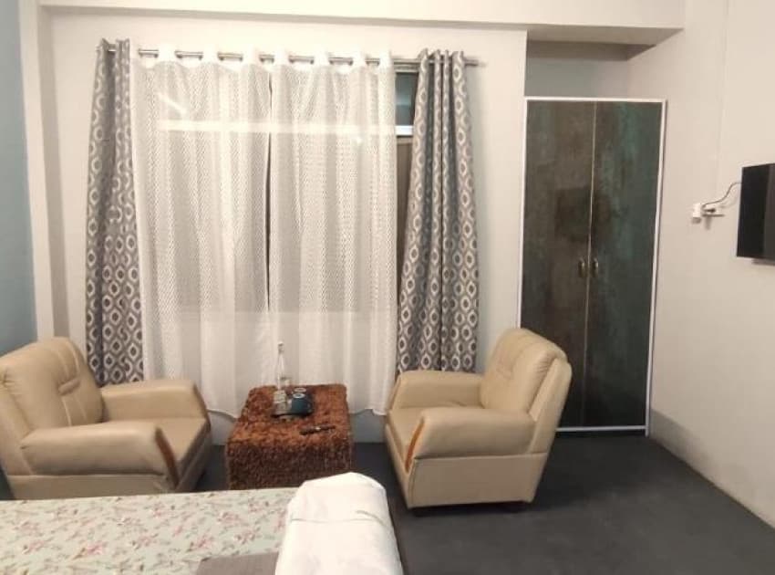 Book Orange Room (French Balcony with City View) room in Shillong