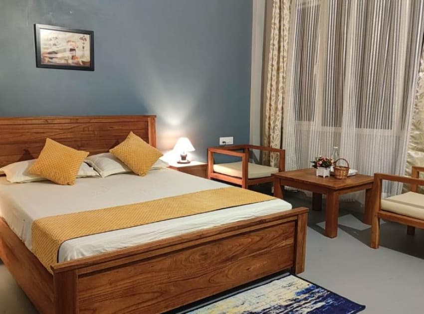 Book Orange Room (French Balcony with City View) room in Shillong