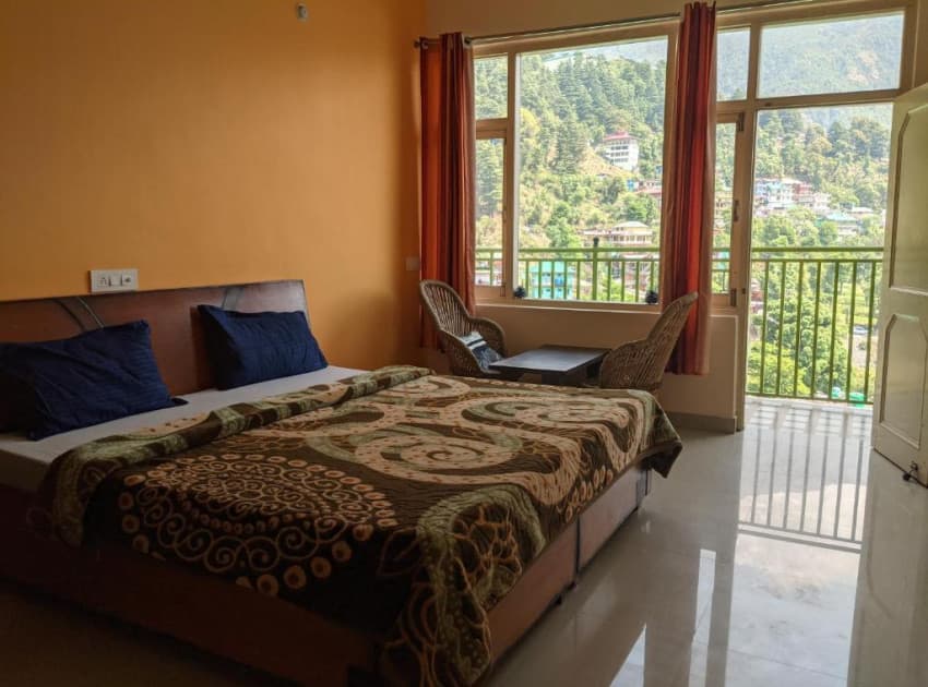 Book Double Room with Balcony room in Dharmashala