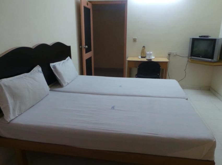 Book Standard Double Room with Fan room in Calicut