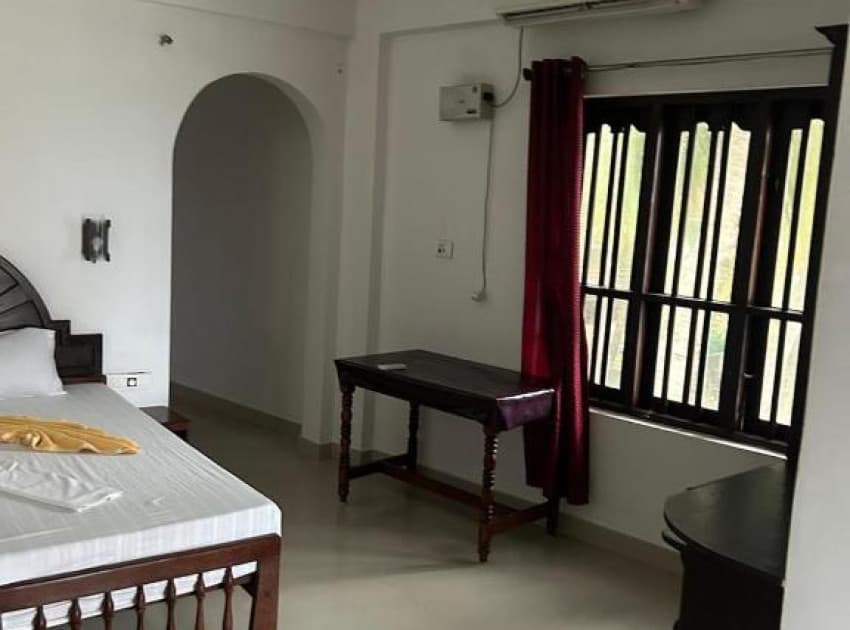 Book Standard Double Room with Fan room in Trivandrum