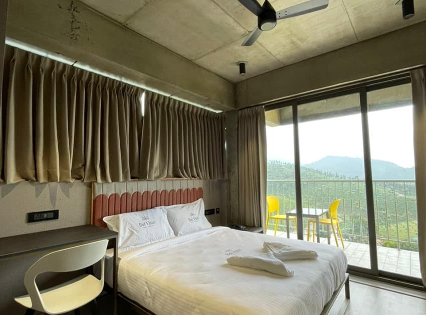 Book QUAD ROOM WITH VALLEY VIEW BALCONY room in Valparai
