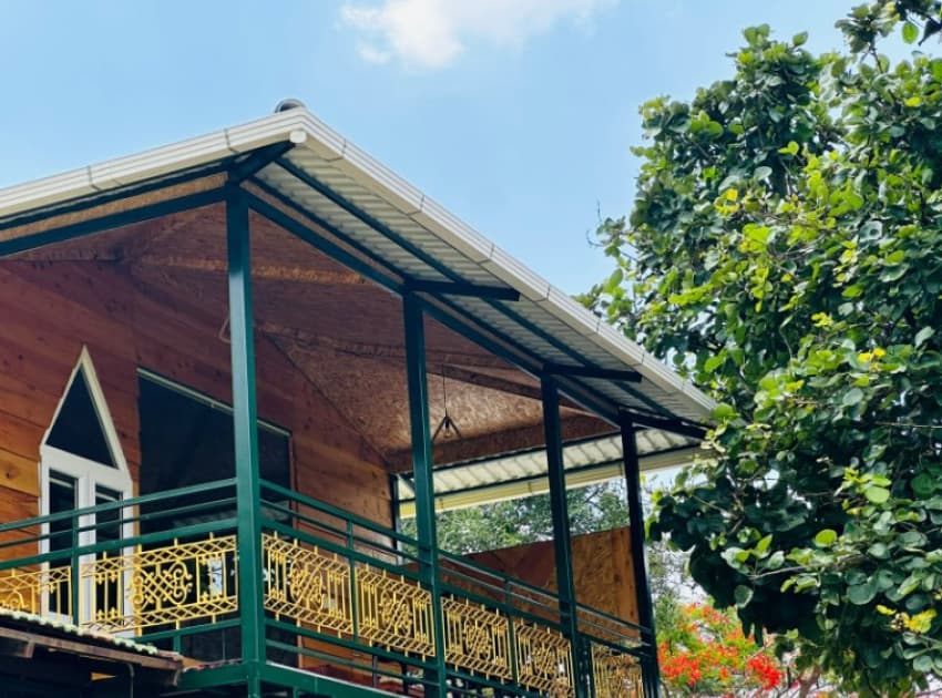 Book Four Occupancy Hut House with Garden View Balcony room in Masinagudi