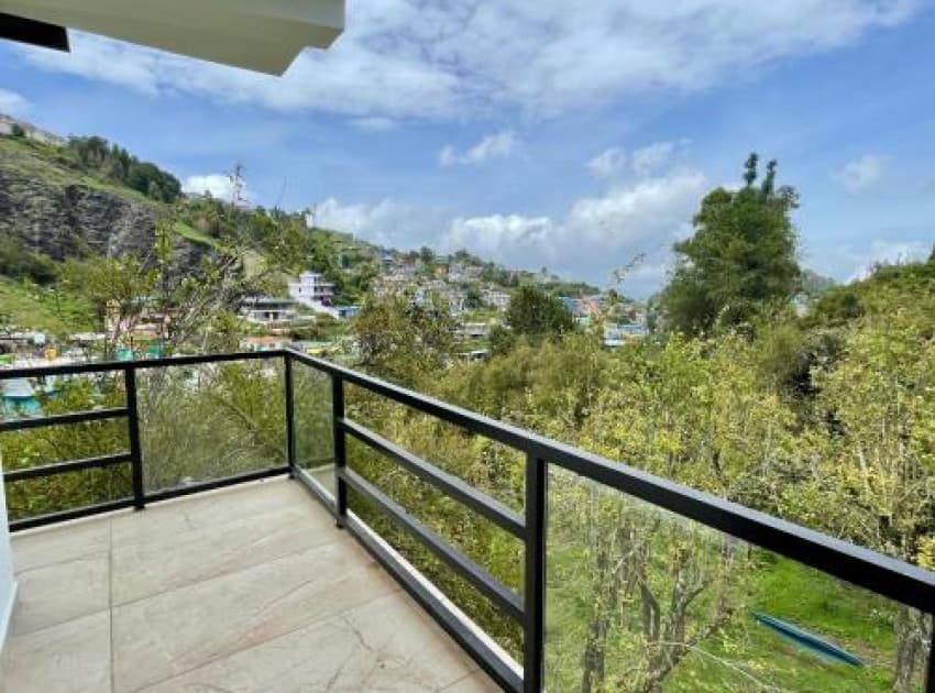 Book Quadruple Room with Balcony room in Kodaikanal