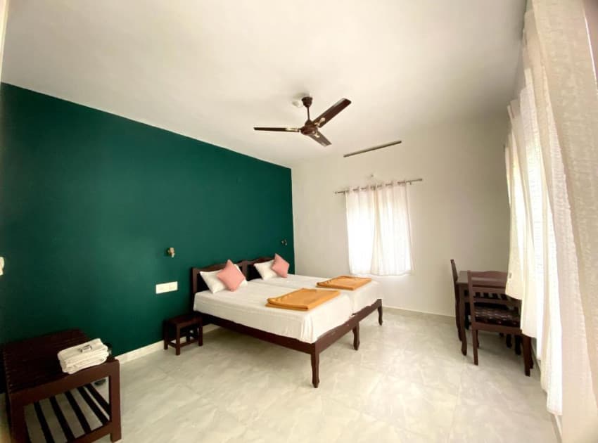 Book Double Room With Balcony room in Thekkady