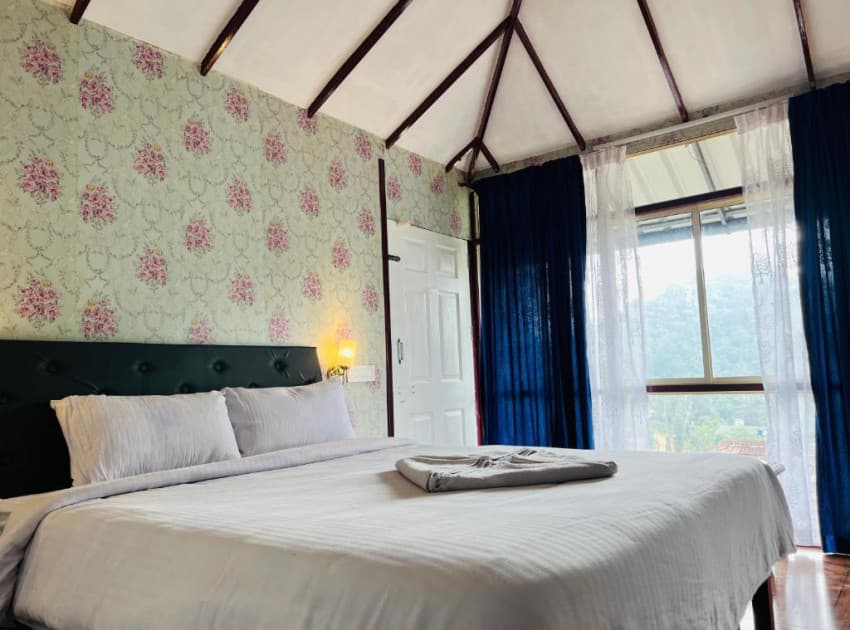 Book Double Room with Mountain View room in Wayanad