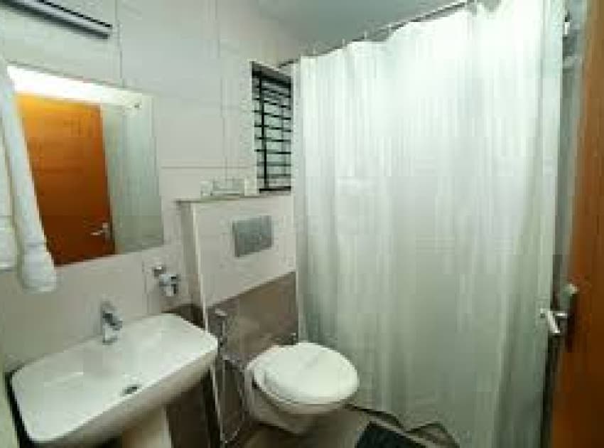 Book Deluxe Room room in Guruvayur