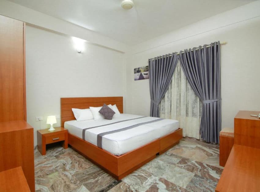 Book Queen Room room in Kannur