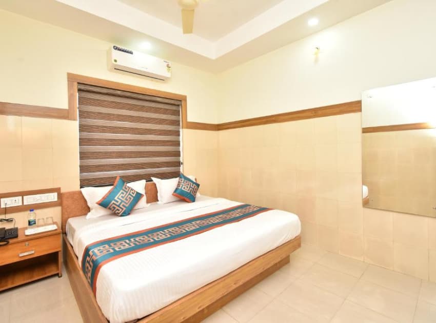 Book Standard Double Room with Fan room in Kannur