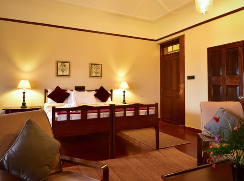 Book Wooden Chalets room in Valparai