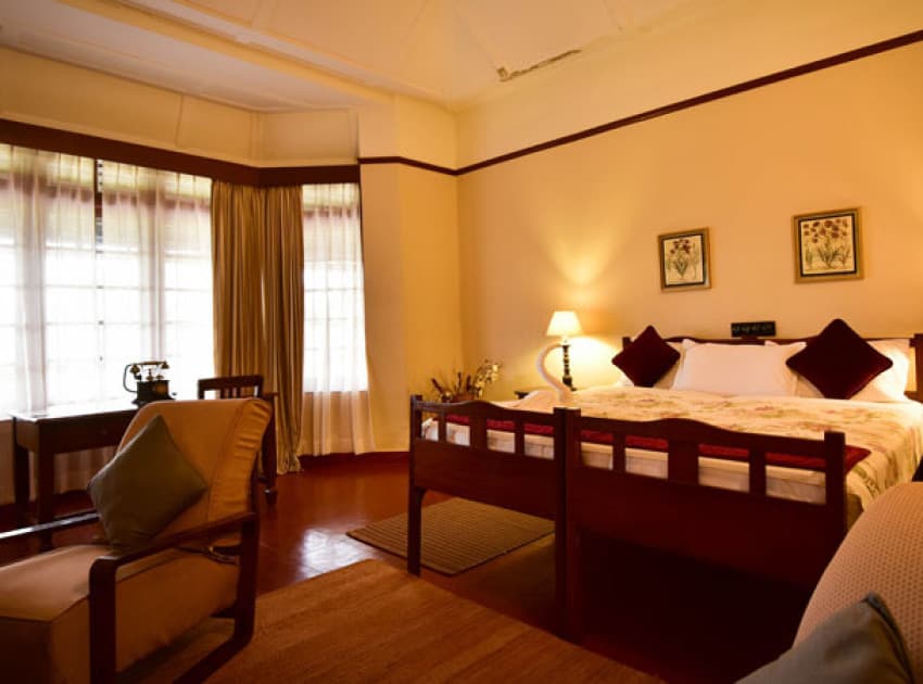 Book Wooden Suites room in Valparai
