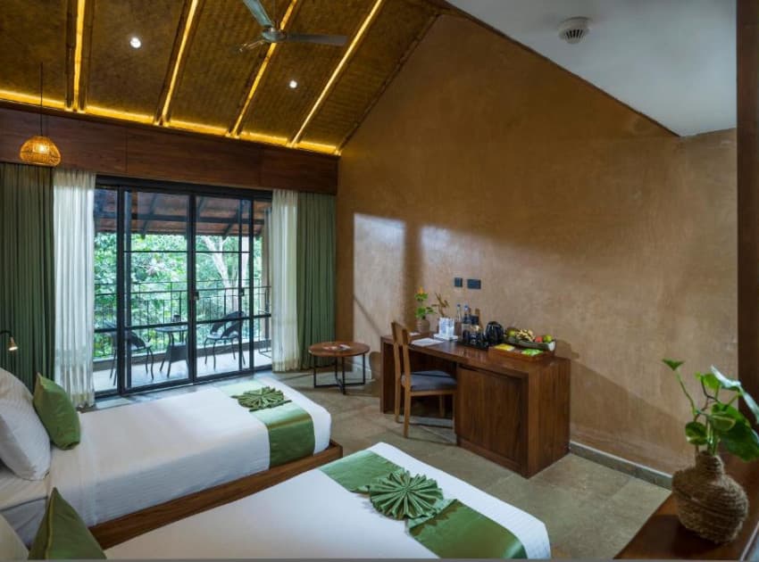 Book Double Room with Balcony room in Wayanad