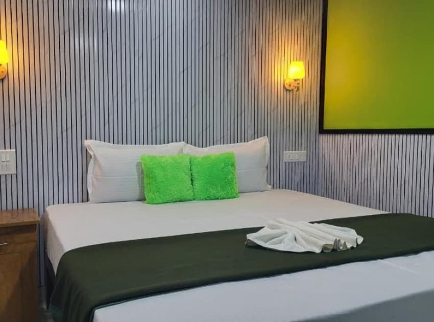 Book Deluxe Double Room With Balcony room in Kollam