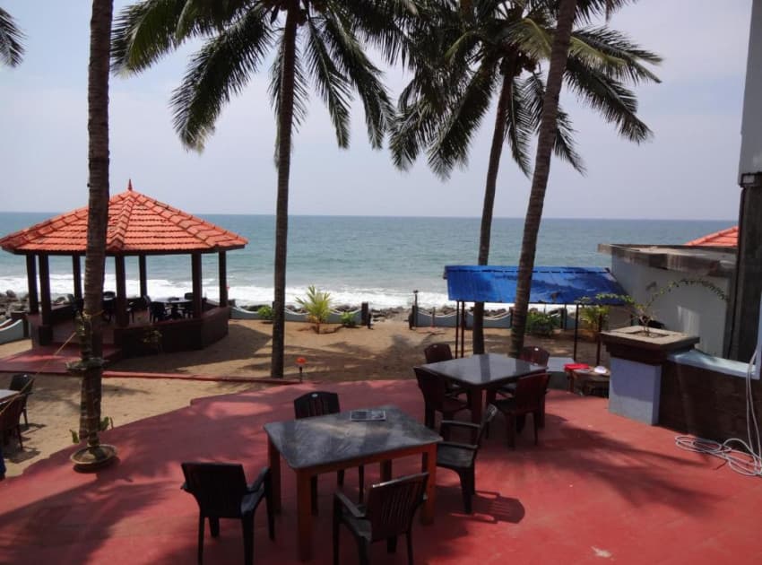 Book Deluxe Cottage room in Varkala