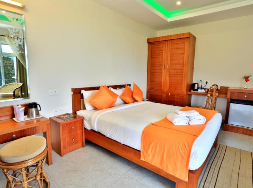 Book Grand Deluxe room in Munnar